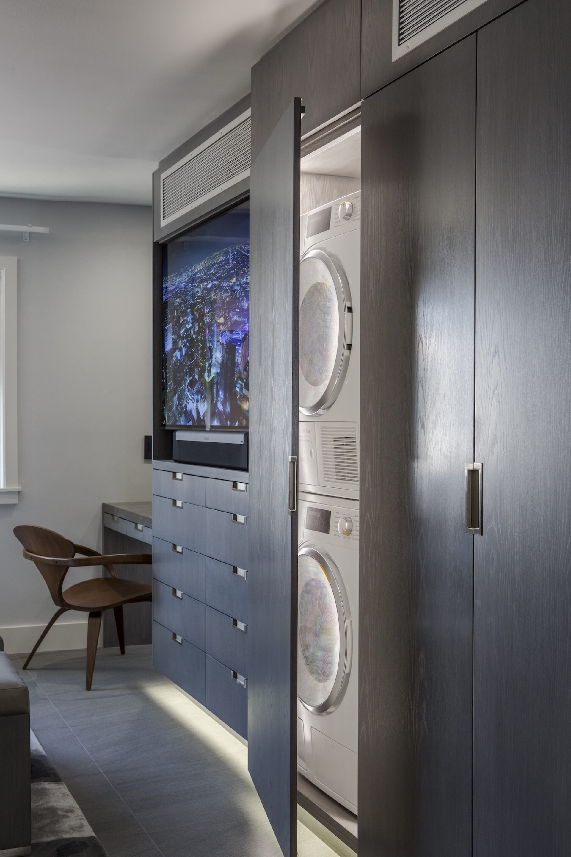 Bedroom With Washer And Dryer Built In Cabinet