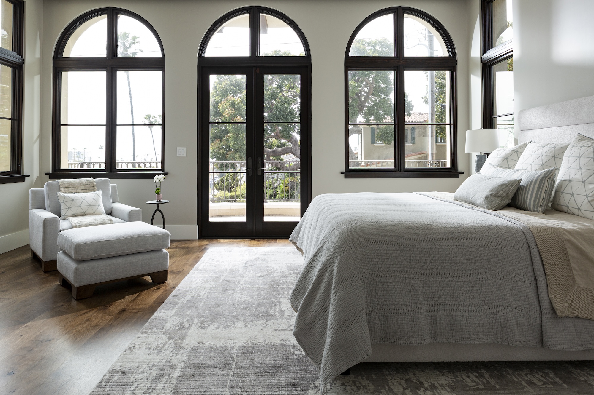 Primary Bedroom Design Large Arched Windows