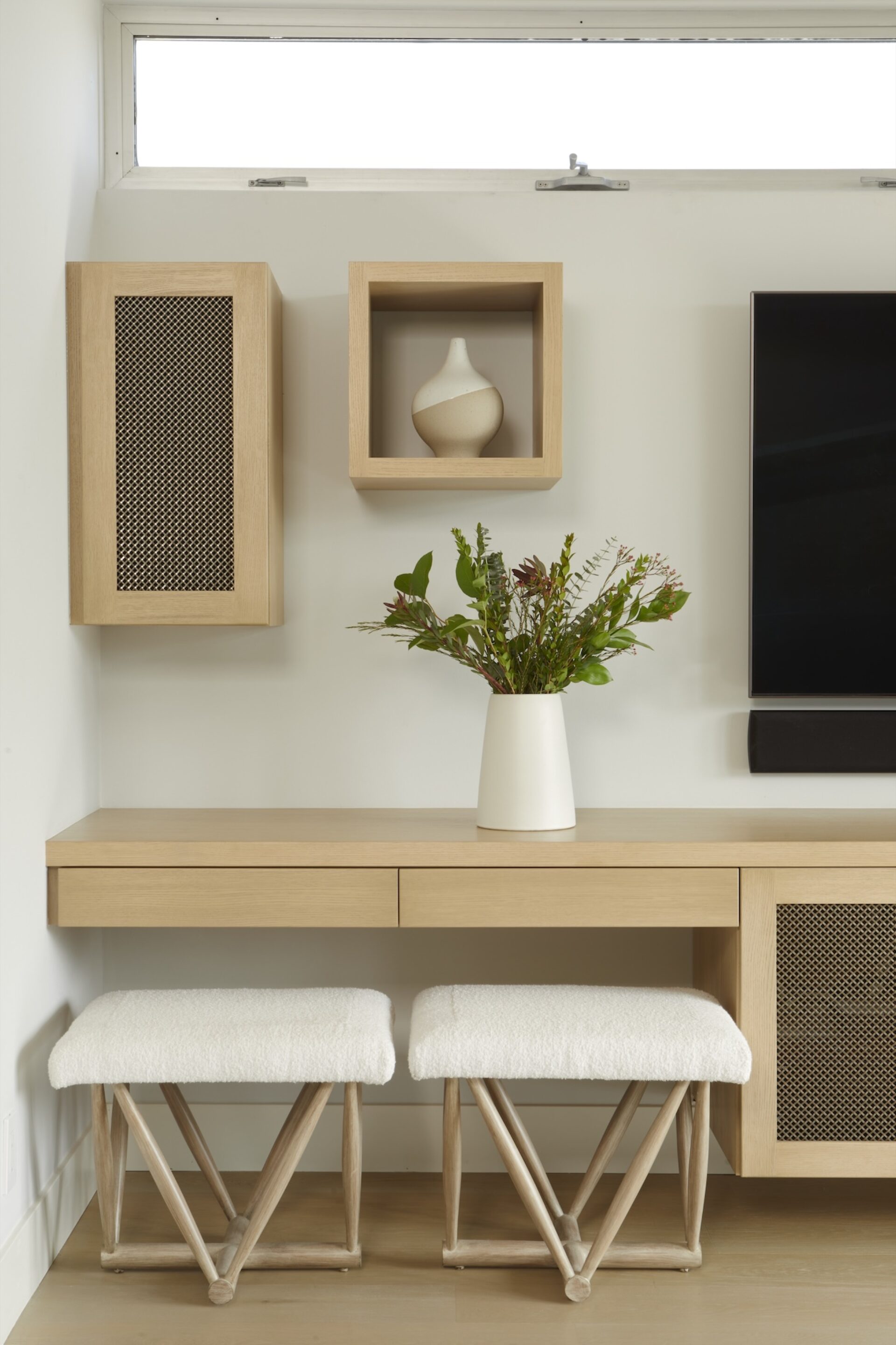 Two Ottoman Stools Under Tv Console